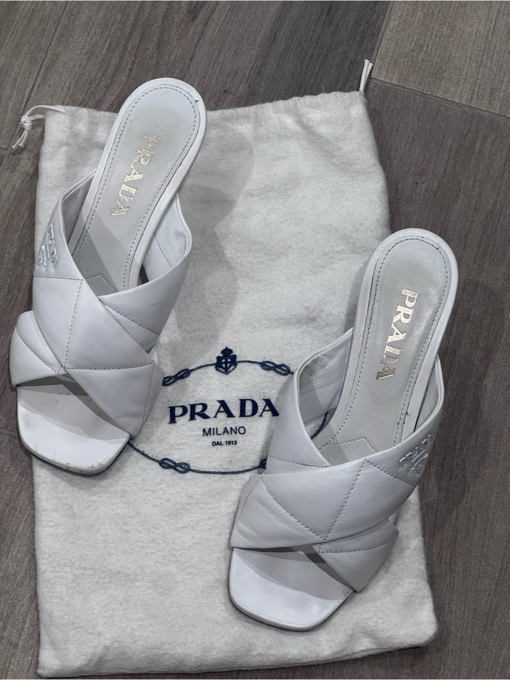 Prada Quilted White Leather Crossover Slide Mules